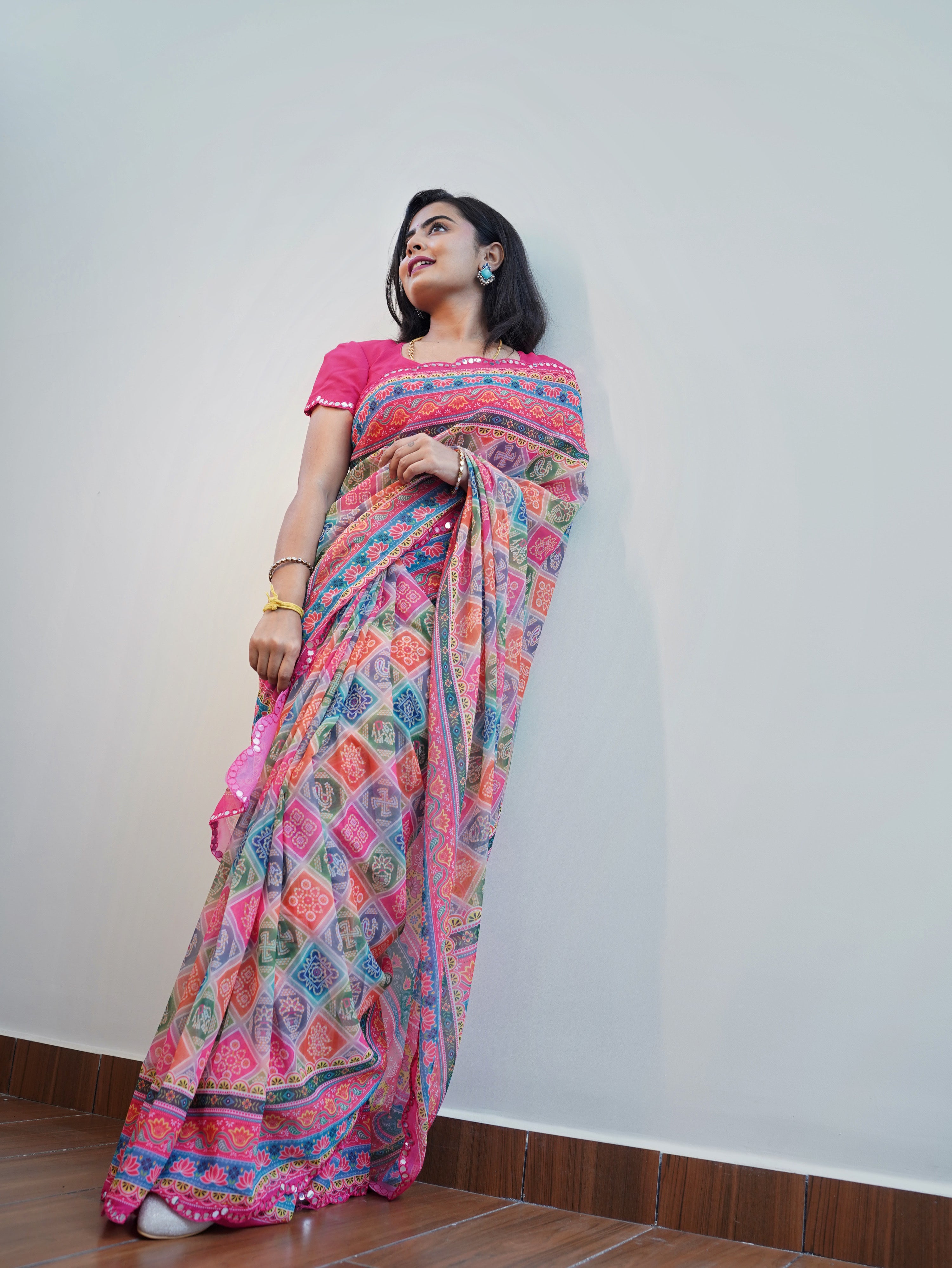 Multi color georgette saree with printed & mirror work with arco border (CODE-041)